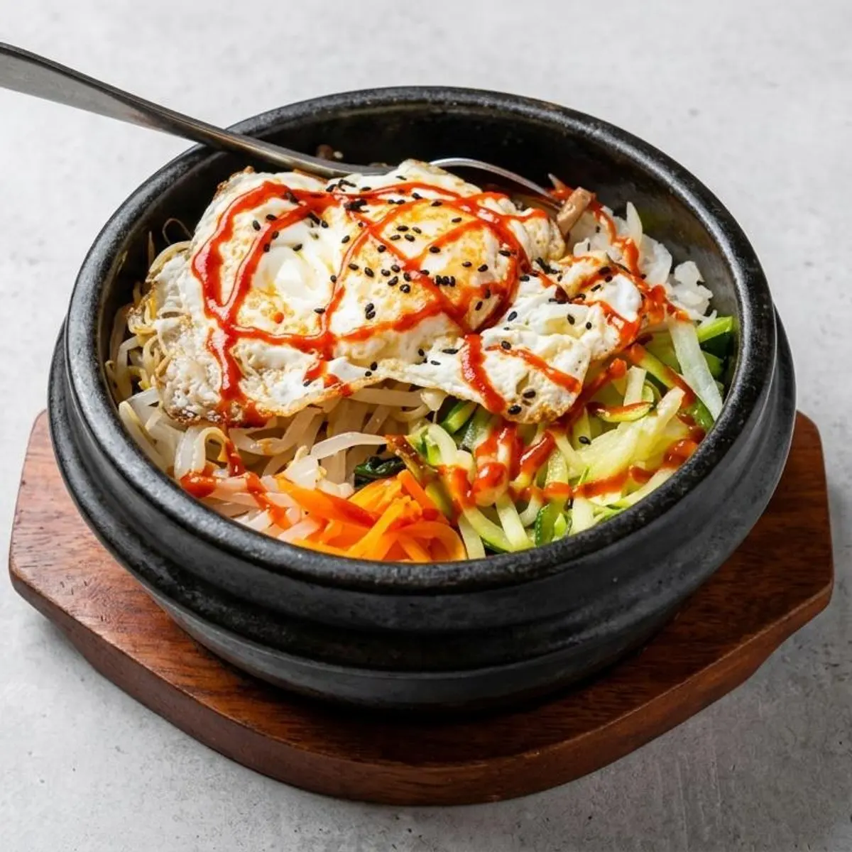 Bibimbap in a stone bowl at Abis in Greenwich