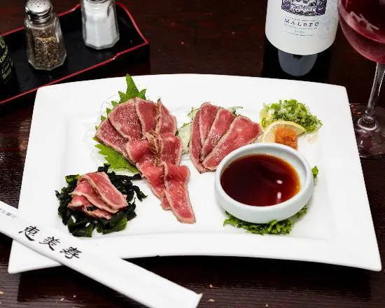 Sashimi arranged on a rectangular plate at Abis in Greenwich