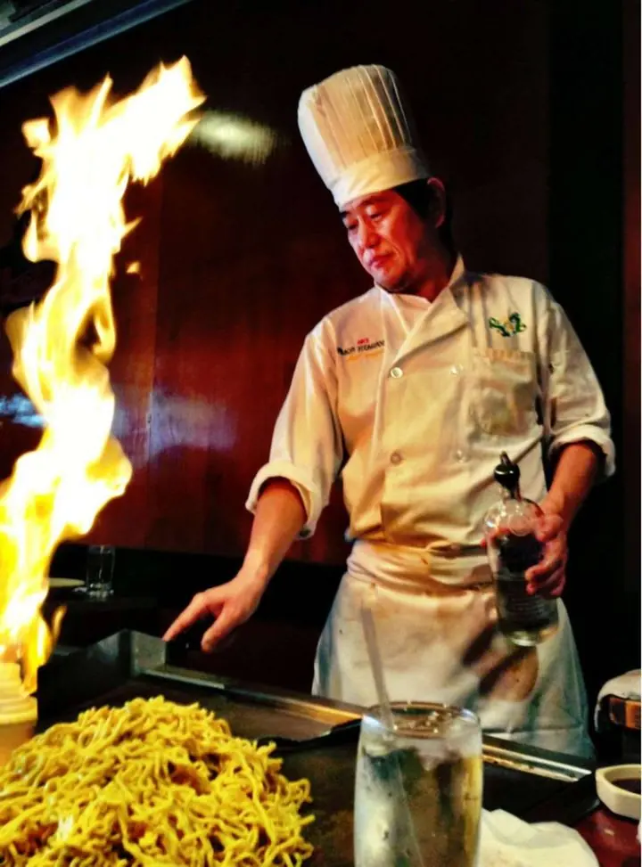 Chefs at the hibachi grill with flame at Abis in Greenwich
